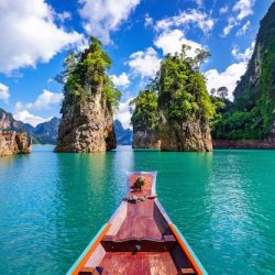 https://img.freepik.com/free-photo/beautiful-mountains-ratchaprapha-dam-khao-sok-national-park-surat-thani-province-thailand_335224-851.jpg